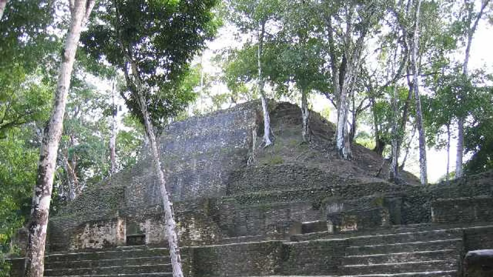 Restored stone temple and plaza at the Cahal Pech Maya site on a hill above San Ignacio, Cayo District, Belize